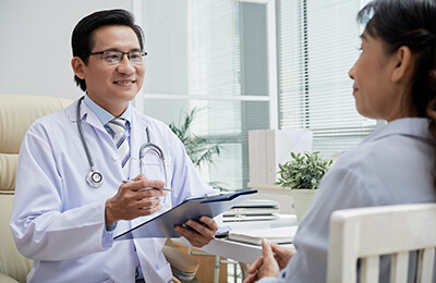 Doctor speaking to patient