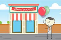 Ben holding balloons in front of a store with a grand opening banner on it